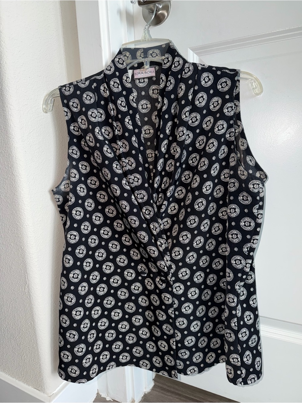 Sleeveless Black & White Printed V-Neck Blouse